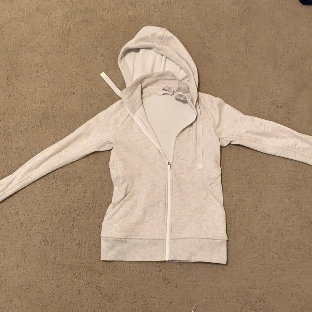 I am selling an Athleta white women’s jacket.